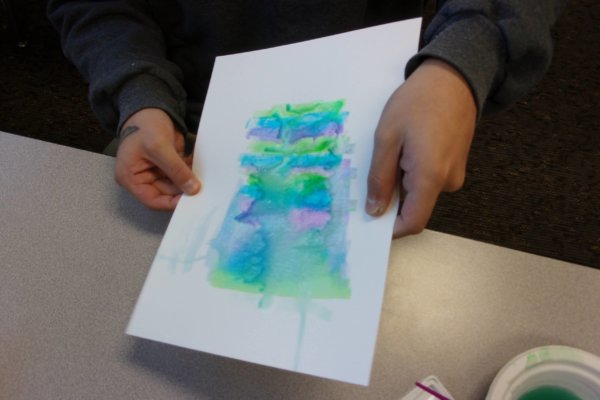 Students at a Youth-In-Custody facility participated in an art-science workshop and learned about the concept of turbulence and the effects that the turbulent properties of water have on watercoloring. Students then made watercolor "flexigons" with abstract designs and haikus